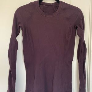 Lululemon long sleeve, skin-tight athletic top.